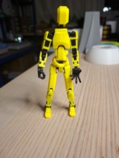Listing image for Yellow Articulated Robot – 3D Printed Poseable Figure Desk Display Toy